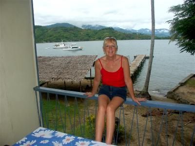 Rene sitting on the verandah after a long day on the boat
