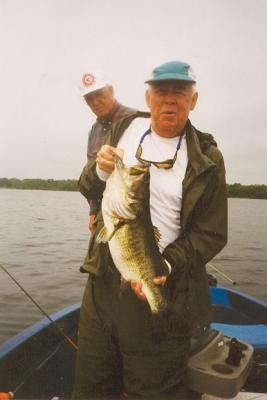 Bill lands an 8lb  bass in Kissimmee , Florida