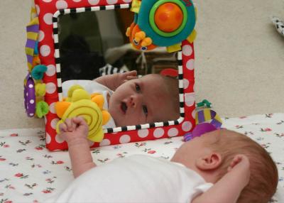 Emily and her play mirror