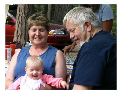 Emily enjoying time with Grandma and Grandpa