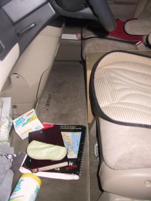 No overlap on the front floormat either. Yes, the seat cushions are ugly as heck, but they are great for my wife's bad back!