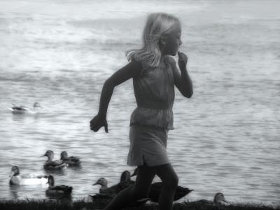 Girl Running with Ducksby Cheryl Meisel