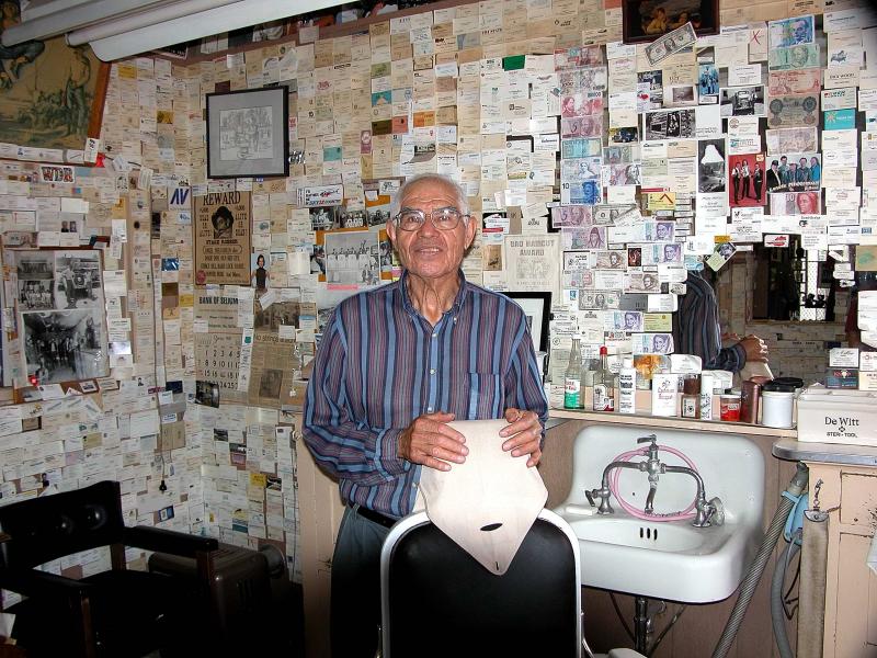 Angel Delgadillo in his Seligman Arizona barber shop