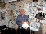Angel Delgadillo in his Seligman Arizona barber shop