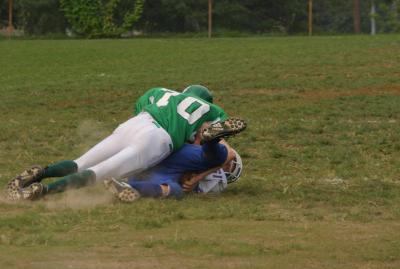 Dan Brehl making a hard tackle