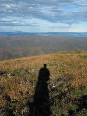 The shadow of a tired hiker