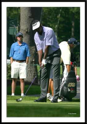 Vijay Singh preparing to tee off.