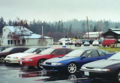 Subaru SVXs in the parking lot