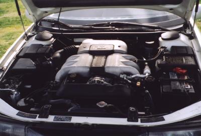 Under the hood of a Pearly Subaru SVX