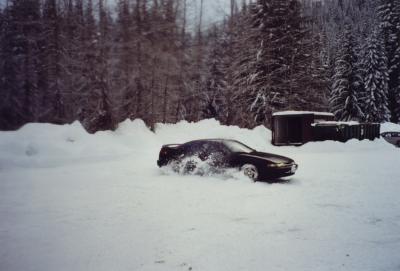 Subaru SVX spraying snow