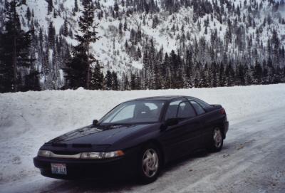 Ebony SVX on the side of the road