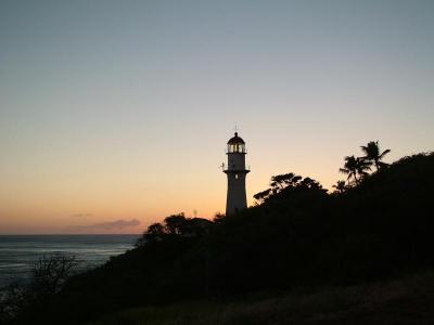 The setting of the sun on Diamondhead Lighthouse
