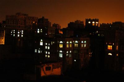 Lights of a traditional Yemeni house in Old Town Sanaa from Arabia Felix Hotel
