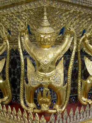 Encircling the exterior of the bot are 112 garudas decorative gilt figures, Wat Phra Kaew