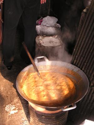 boiling the sugar out the coconut meat