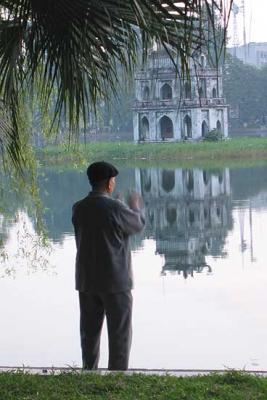 Morning exercises by Hoan Kiem Lake , Hanoi