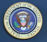The Presidential Seal.