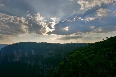 Sunburst over the blue mountains