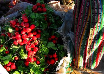 market radishes with traje, guatemala