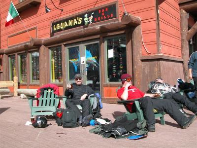 Having a beer and relaxing at the base of the mountain on a sunny day.