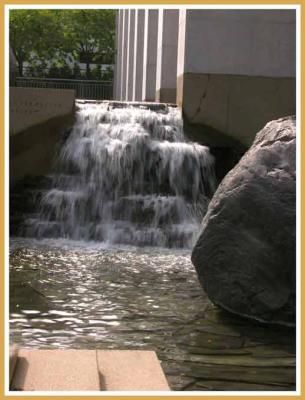 Fountain at building entrance.
