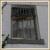 Ornate apartment window.