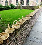 Sweet grass baskets line a street downtown