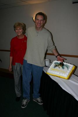 Eric with his mom and his graduation cake