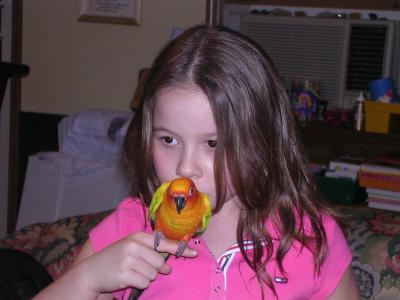 3-27-04 My Daughter and Her Bird Skittles