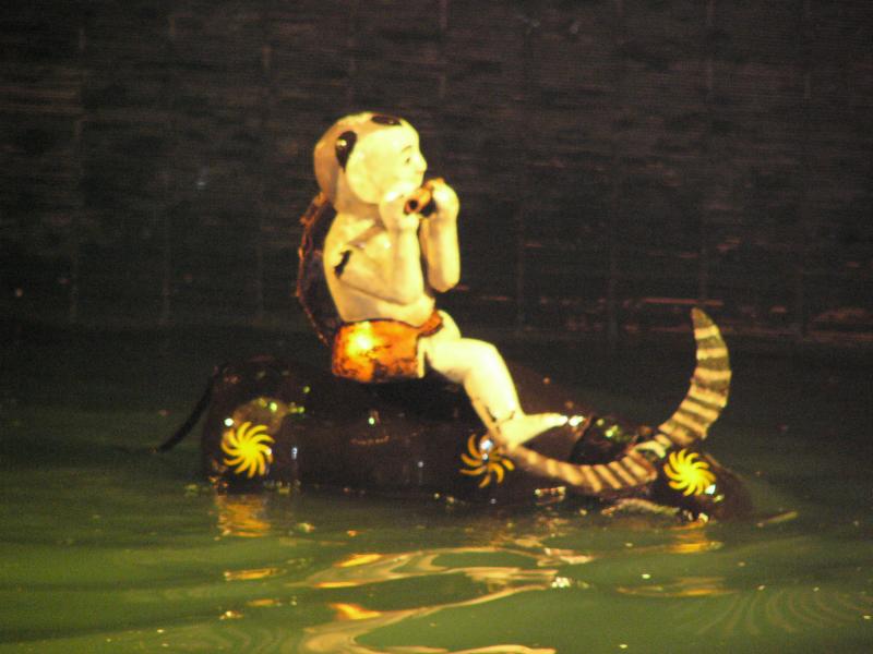 Playing the flute on a water buffalo