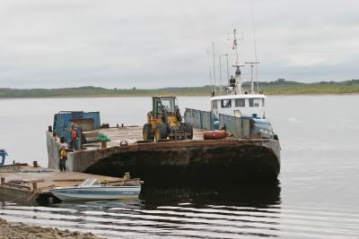 Barge being tied up at Moosonee