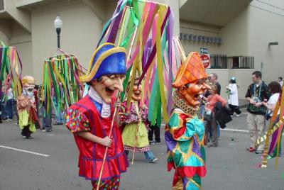 FIGURE HEADS IN THE REX PARADE