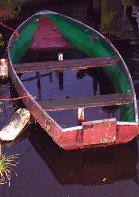 Old green red boat