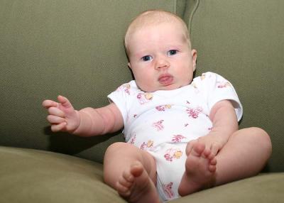 Who left the doll on the couch?