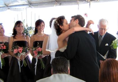 Chad kisses his bride.