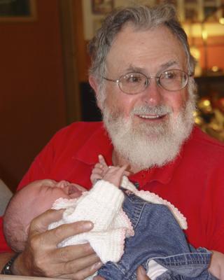 My father with his first great-grandchild.