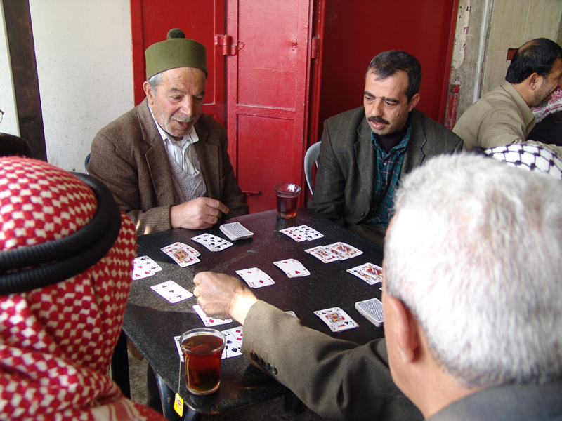 a game of cards*<br> by guy evron