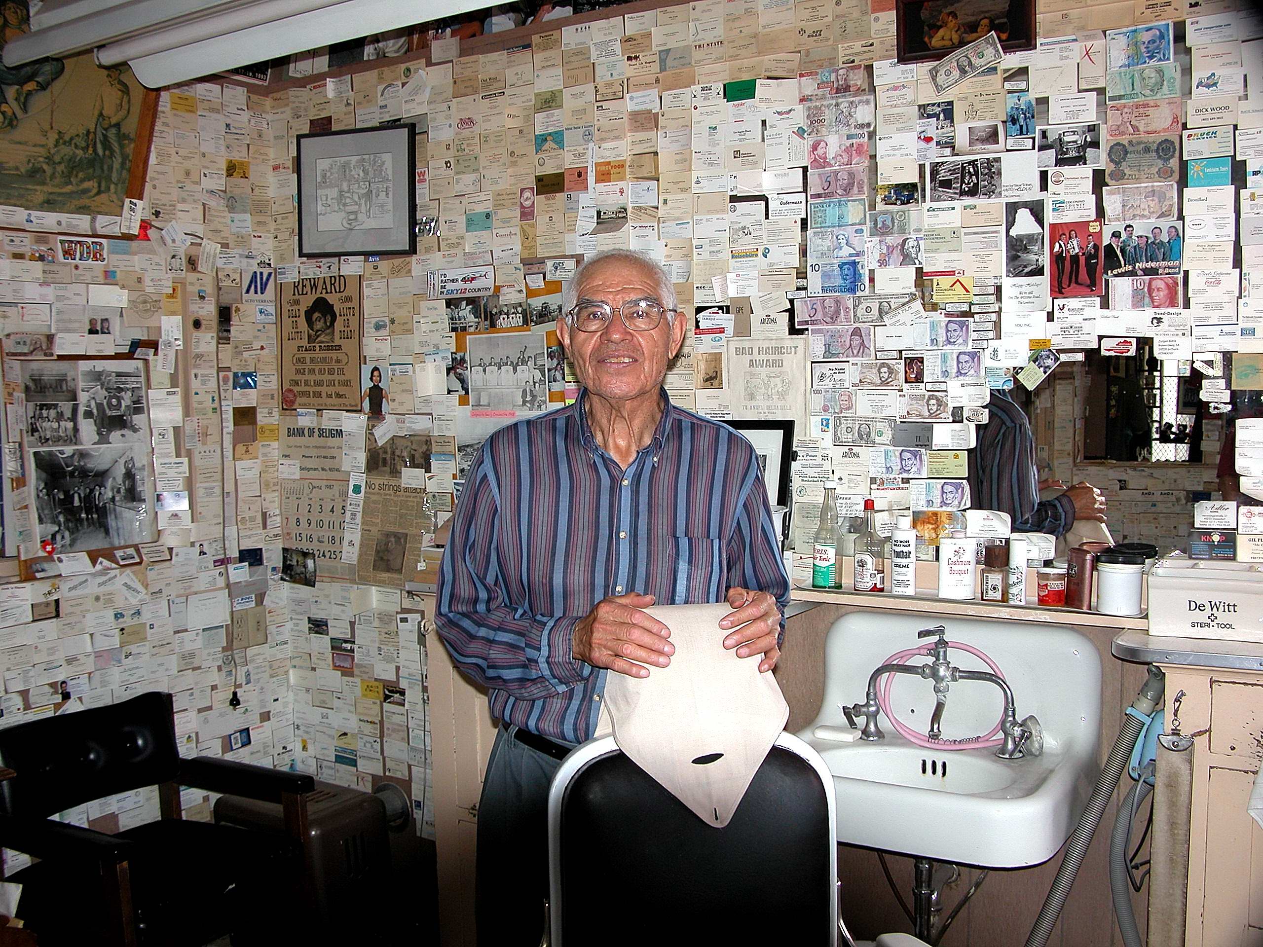 Angel Delgadillo in his Seligman Arizona barber shop