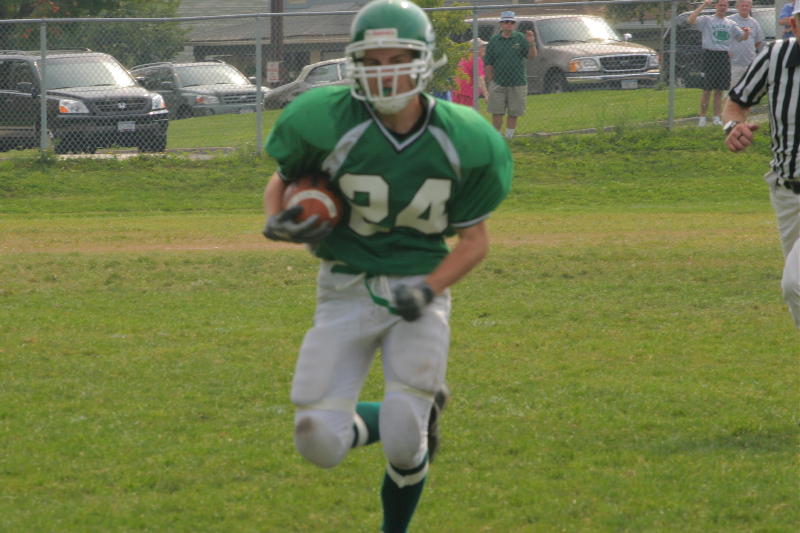 Ryan Cook running with the ball