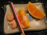 Dessert - orange slices drizzled with condensed milk and little cookies with pictures.