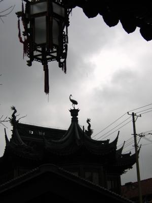 Roof ornamentation against the grey sky