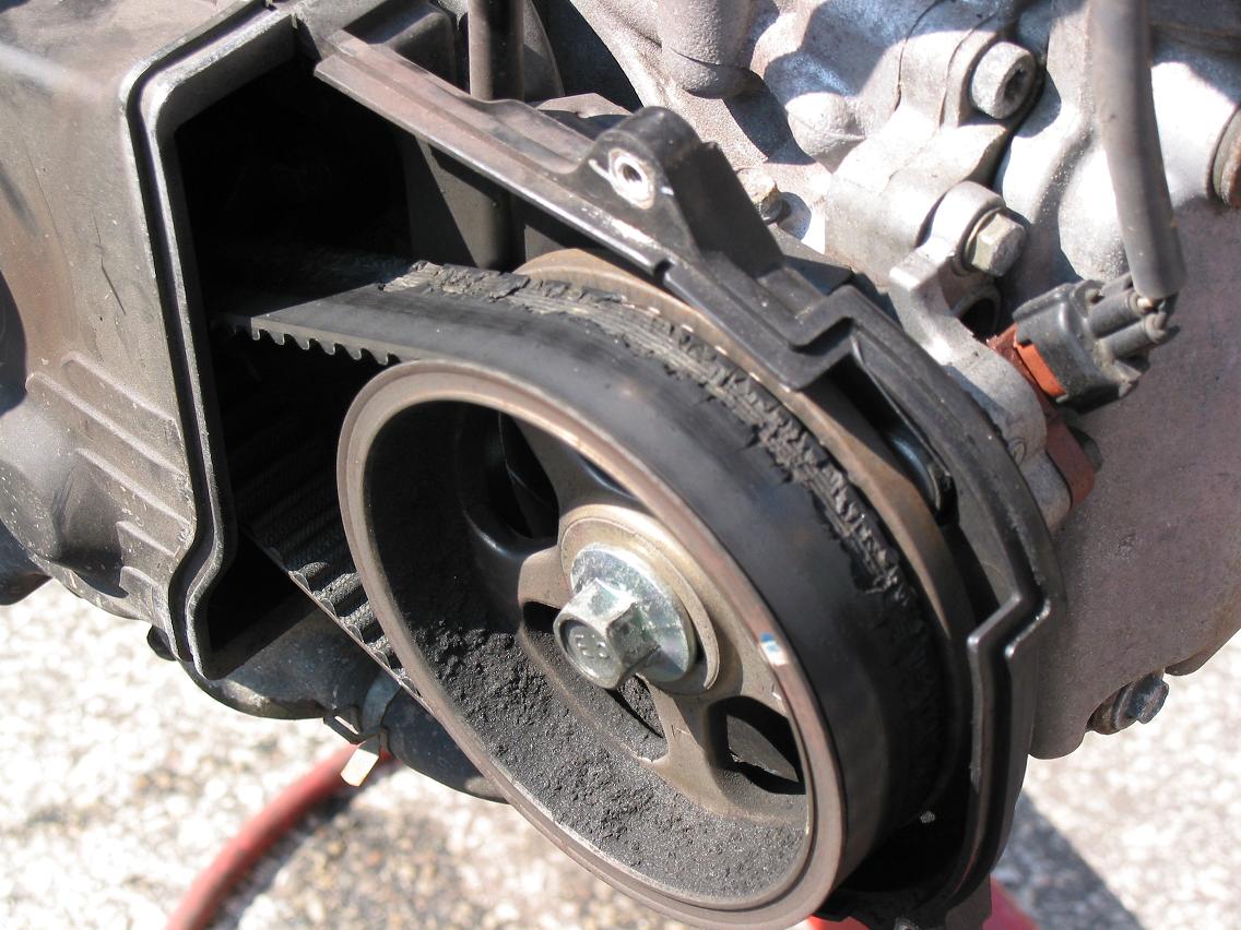 Driver-side cam pulley + toasted timing belt