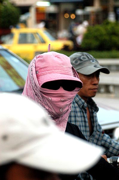 The exhaust fumes in Saigon aren't nearly as bad as those in some other Asian cities, but many people wear scarfs