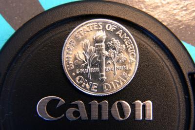 12mm extension tube
2 3/8 lens edge to dime
