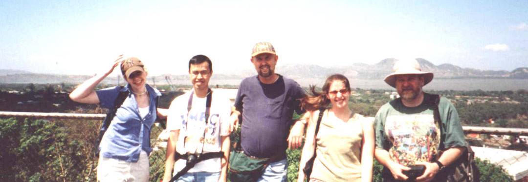 Group along fence in Managua