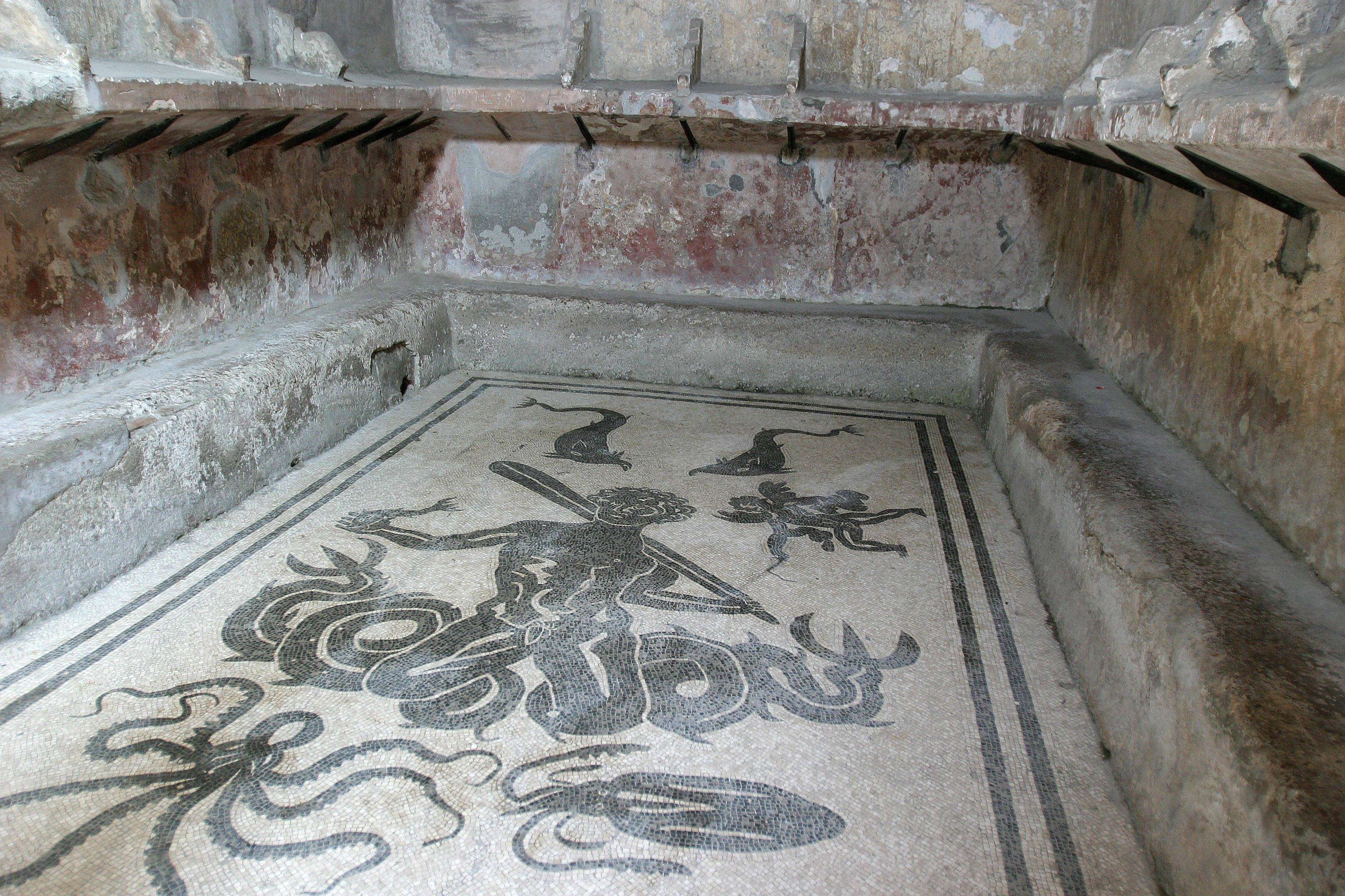 This photo is taken in the mens sector of the Central Baths. The mosaic on the bottom of this pool is Triton - son of Neptune.