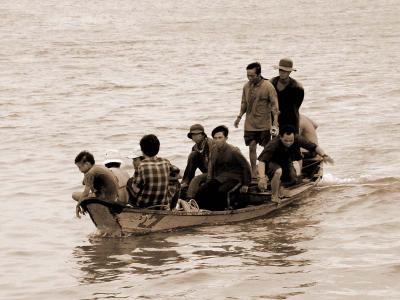 Seventh Place - Boat people by Antoine