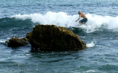 Surfing Rocks Dude ! 1