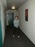 Julie tries out her funky new rollerskates in the hostel.  Wired for sound.........
