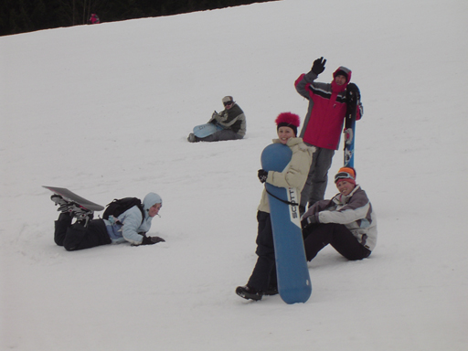 Julie became official photographer for a couple of days as she did her ankle in.  Here, the gang waves to her on the chairlift.